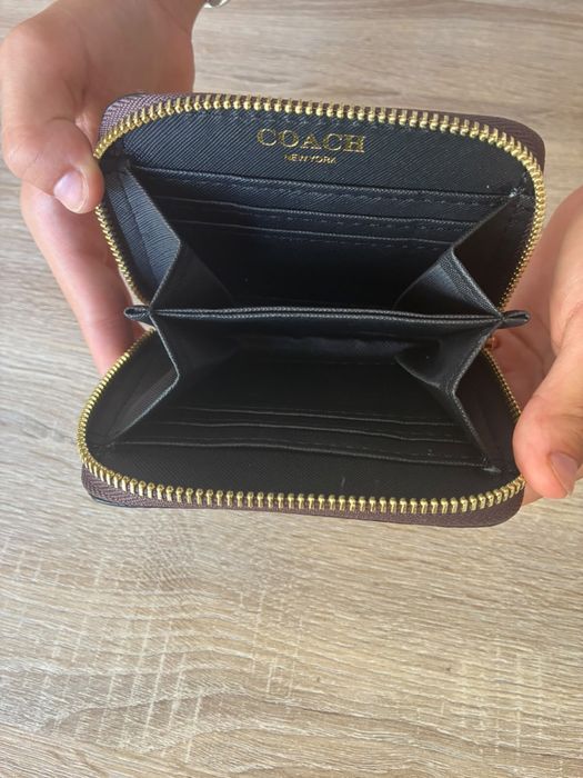 Porta moedas Coach