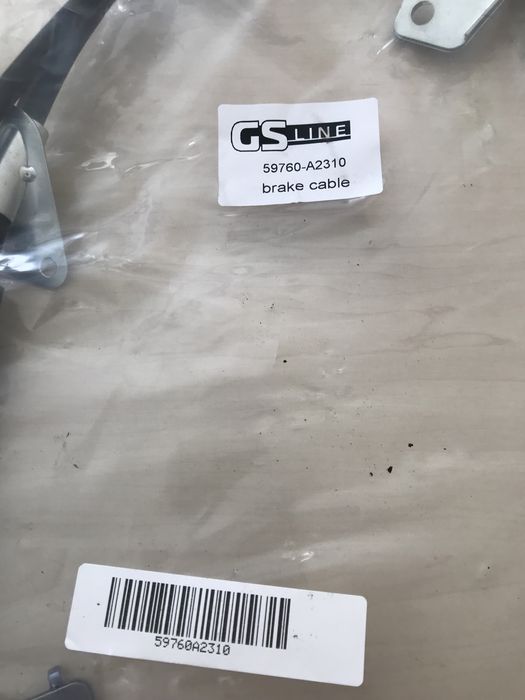 Трос ручника задний левый  59760А2310 Киа сид , Хюндай і30 от 2013года