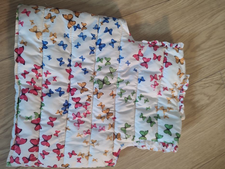 Bezrękawnik w motyle