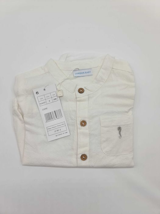 White bodysuit from Lanidor Kids (18 months)