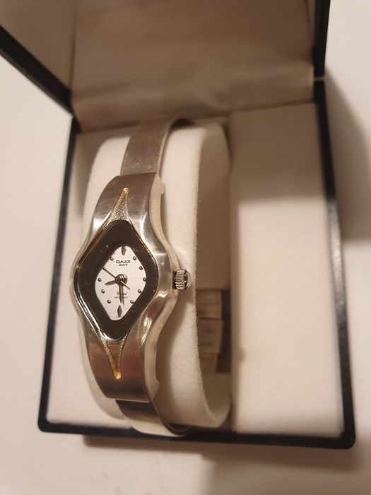 Zegarek damski  stal nierdzewna omax analogowy