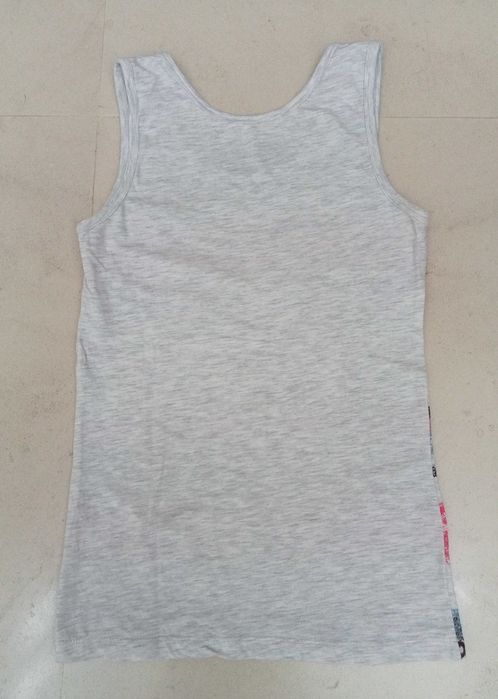 T-shirt sem mangas de criança