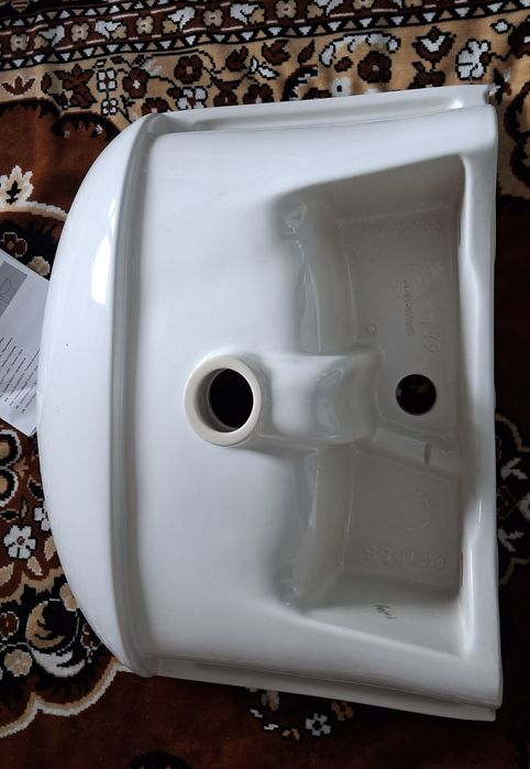 Керамічний умивальник серії KOLO