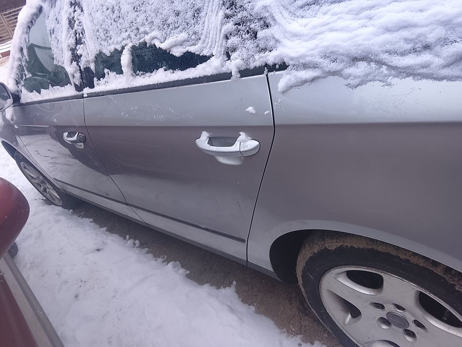 Drzwi lewe passat B6 srebrne