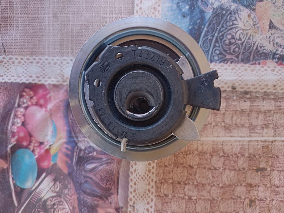 Натяжний Ролик ременя ГРМ групи ваг 1.6 тді