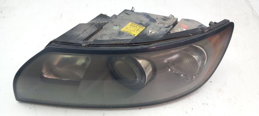 Ótica / farol esquerda VOLVO V50 (MW)