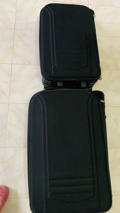 2 malas uma de 23 KL e outra menor de 15 KL