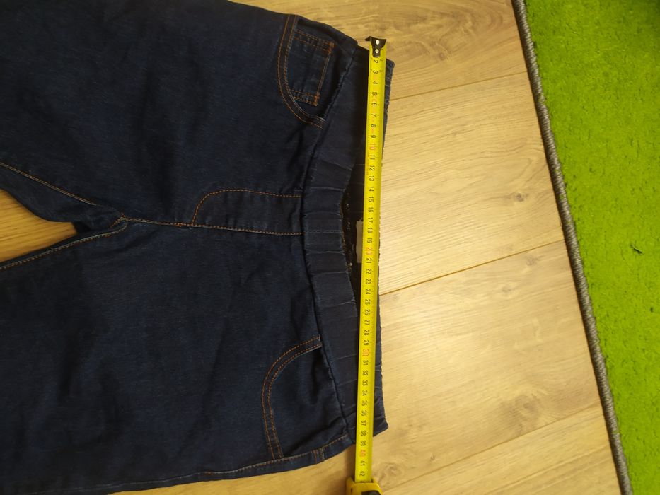 Spodnie damskie jeansy Clock house 38