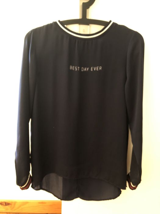 Blusa acetinada Springfield