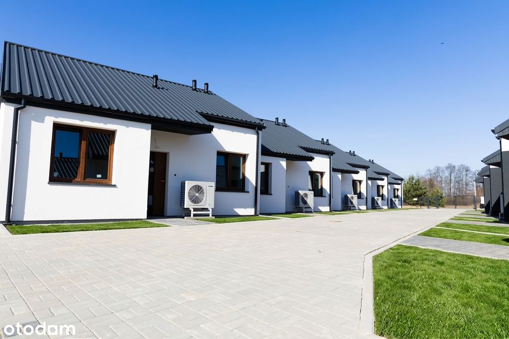 Dom szeregowy w surowym stanie z działką - Widok 2
