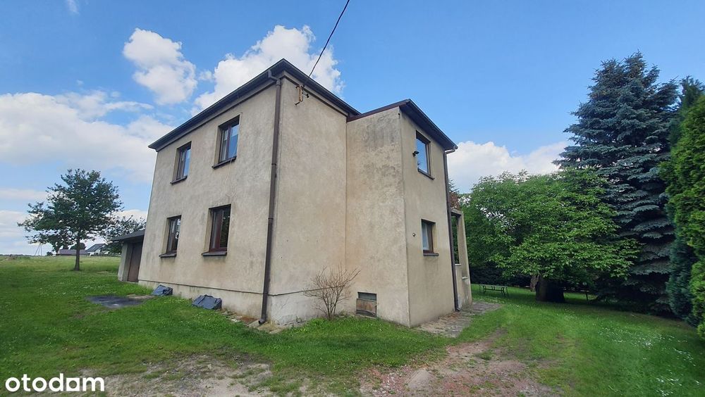 Dom z piwnicą , garażem i dużym ogrodem