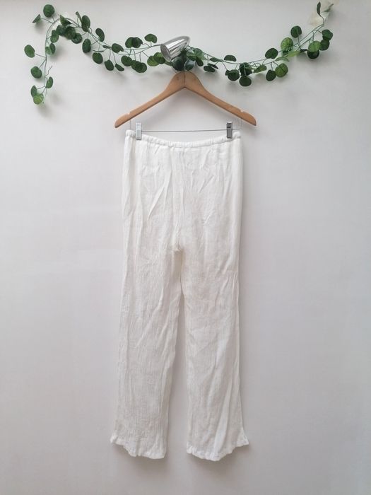 Calças Brancas de tecido fino