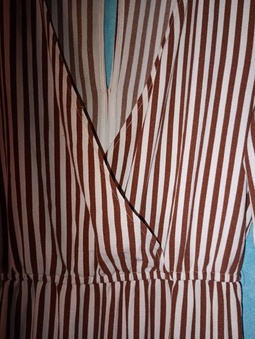 Kremowo-brązowe kombinezon