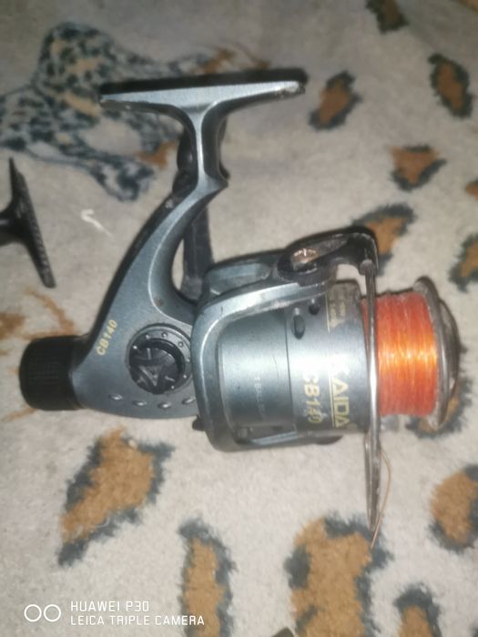 Катушка  для спининга бу в отличном состоянии