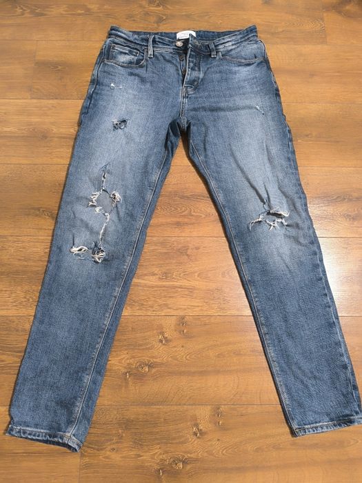 Spodnie jeansowe z przetarciami W30/34