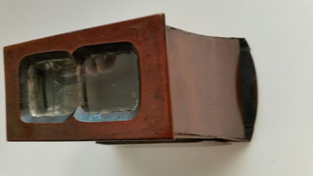 Estereoscópio antigo e fotografias