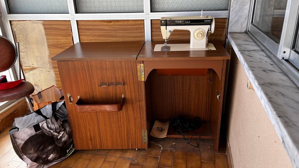 Máquina de costura Singer.