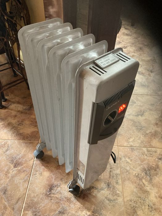 Aquecedor Junex em bom estado de funcionamento