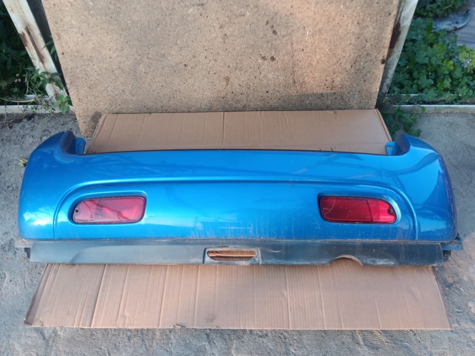 Suzuki ignis I 1 zderzak tył tylny tylni kompletny KPL