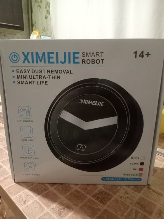 Робот пилосос...