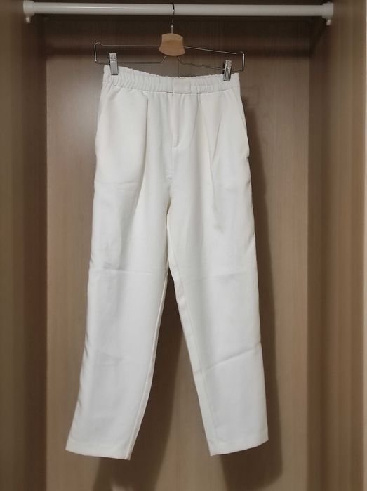 Calças clássicas estilo "chinos"