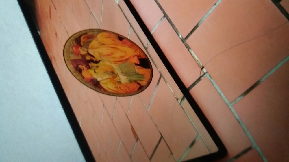 Espelho com gravuras