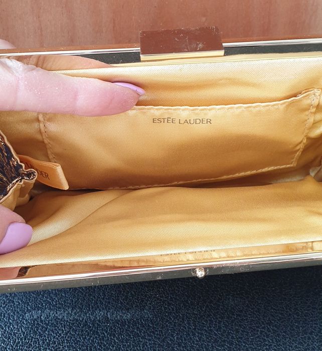 Elegancka kopertówka Estee Lauder