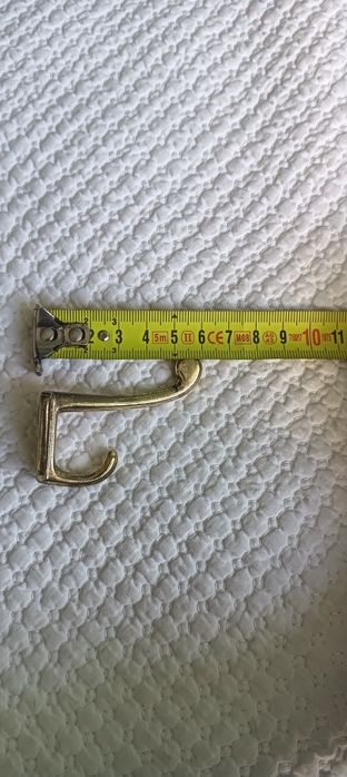 Cabides , ganchos metálicas dourados