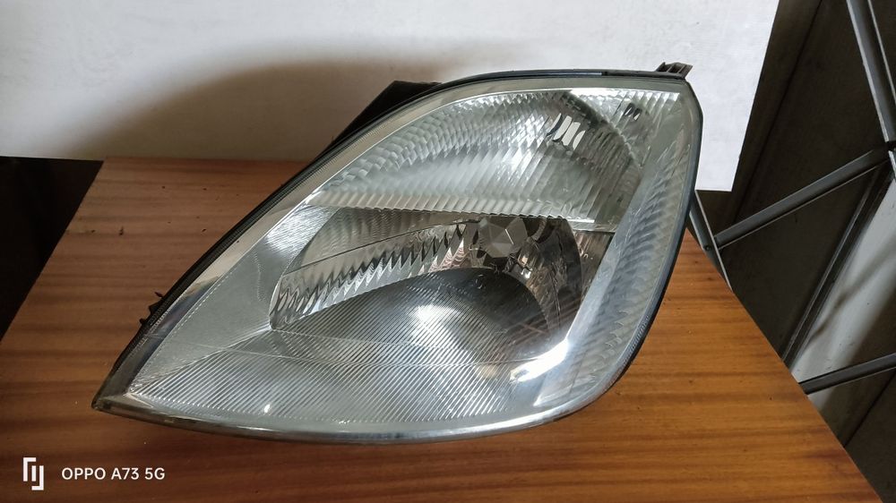 Farol Ford fiesta 5 ótica 2004 esquerda original