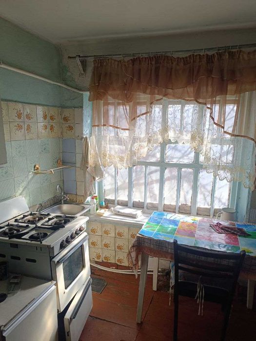 Продаж невеликого будинку біля центрального ринку
