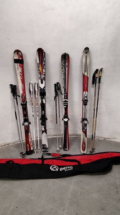 Skis  bastões e saco de transporte