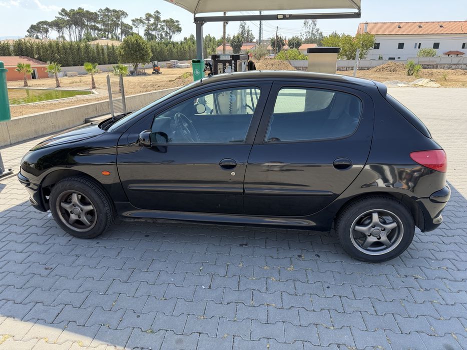 Peugeot 206 a gasolina com 152.000 foto 4