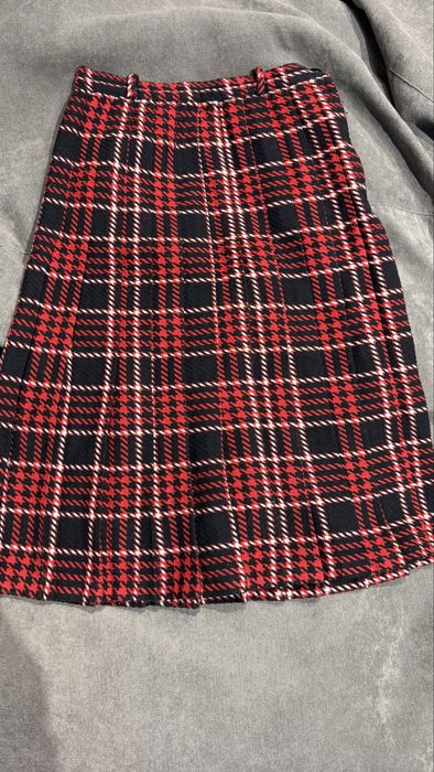 Тепла плісована міді спідниця з вовною