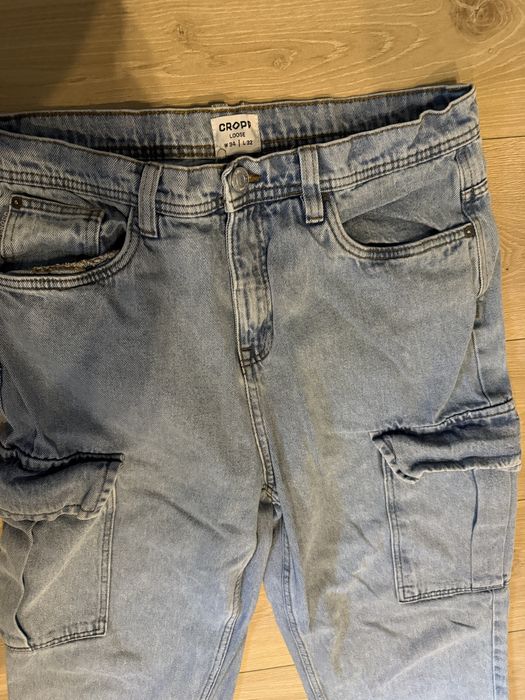 Spodnie jeansowe niebieskie  loose 34/32 cropp