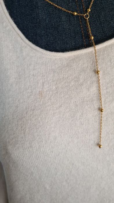 Sweter Tommy Hilfiger. 91% Wełna i 9% Kaszmir. Śmietankowy Maślany. M