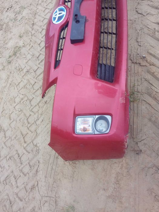 TOYOTA PRIUS III 09-11 zderzak przód kolor czerwony 3r3