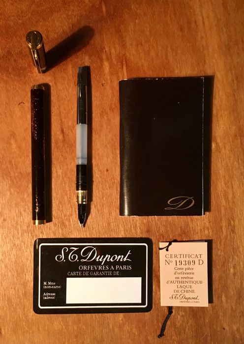 S.T. DUPONT - caneta - acb. ouro e laca da China com pó de ouro