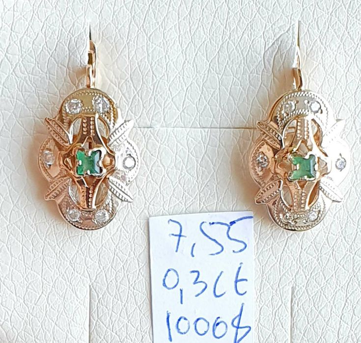 Продам золотые серьги с бриллиантами и изумрудом