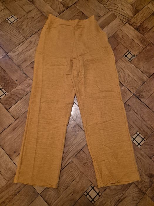 Musztardowe spodnie Nowe M