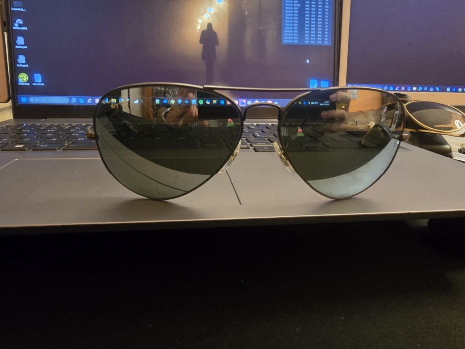 Oculos de sol ray ban lente prateada