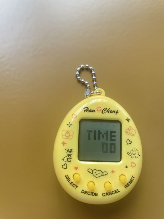 Bichinho Virtual Amarelo -  Estilo Tamagotchi