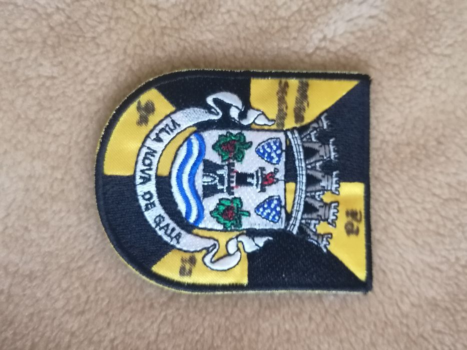 Emblemas capa traje académico.