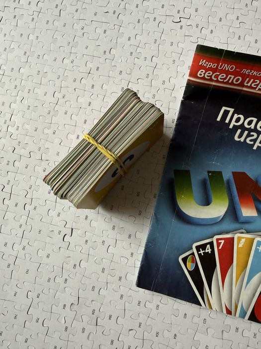 Пазли 1000 кіт планета і гра УНО UNO