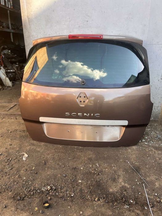 Двері ляда  капот  крило коричневий TCNB на рено гранд сценік 3