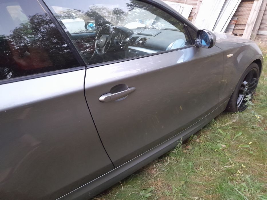Bmw e81 e82 e88 kpl.drzwi prawe sparkling graphite a22 stan bdb