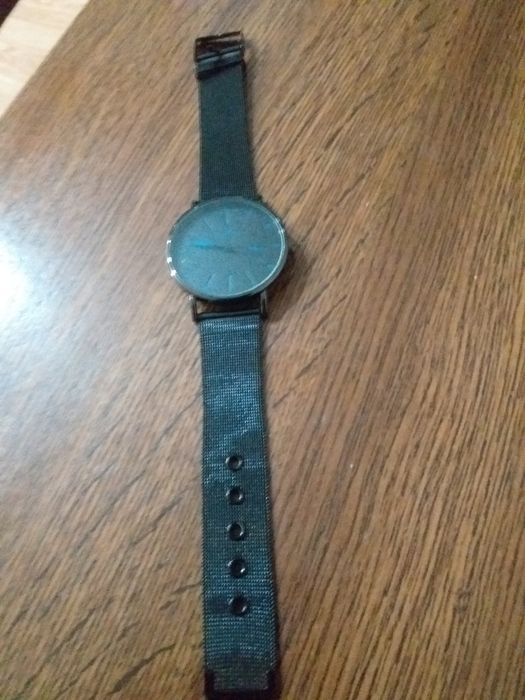 Чоловічий годинник.