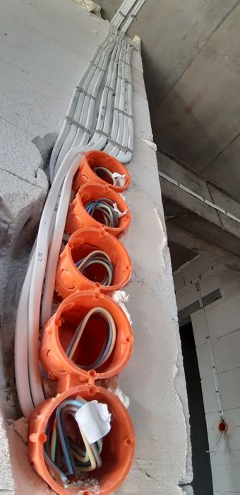 Elektryk Podłączenie płyty indukcyjnej  Pomiary Przeglądy Instalacje