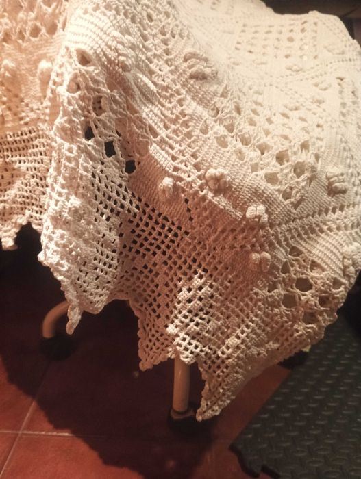 Coberta de renda feita á mão