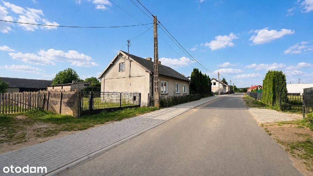 Domek jednorodzinny z budynkami gospodarczymi