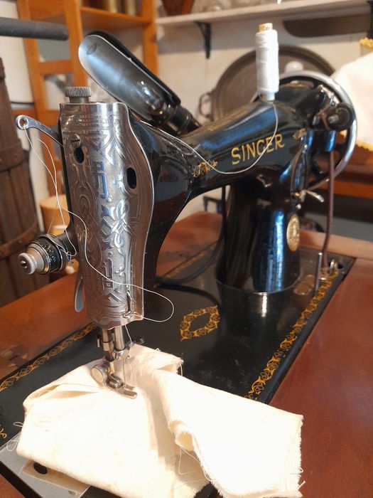 Máquina de costura singer